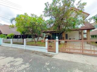 Exterior view of a house with front yard