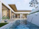 Modern house with pool and patio area