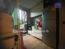 Compact kitchen with modern appliances and storage