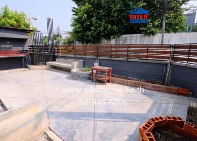 Outdoor area with patio and garden