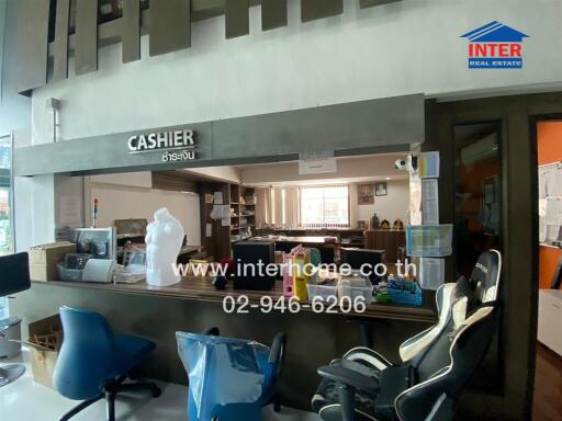 Office reception area with cashier counter and office chairs