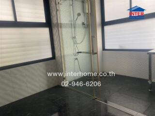 Modern bathroom with glass shower enclosure