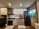 Modern kitchen with wooden cabinets and appliances