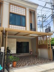 Exterior view of a two-story house with a garage