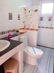 Bathroom with tropical fish decor