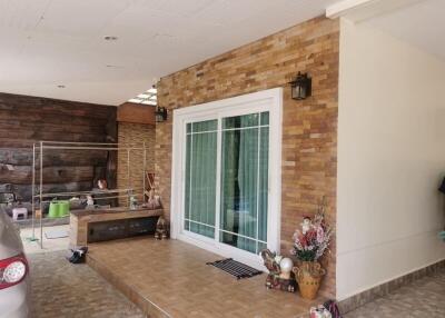 Outdoor living space with sliding glass door