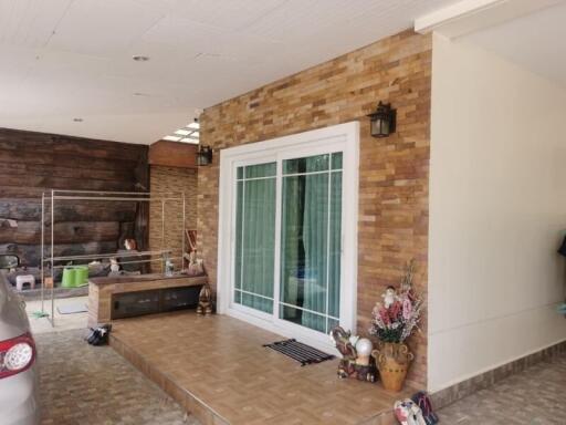 Outdoor living space with sliding glass door