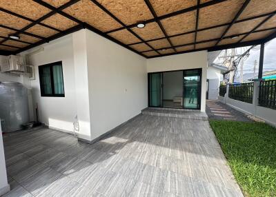Covered outdoor area with tiled floor