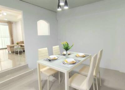 Dining area with modern table and chairs
