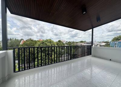 Spacious balcony with view and modern ceiling design