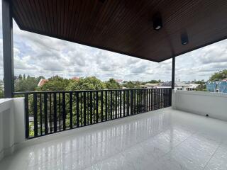 Spacious balcony with view and modern ceiling design