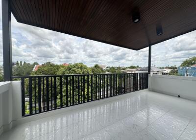 balcony with canopy and view of neighborhood