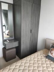 Cozy bedroom with wardrobe and dressing table