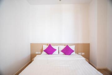 Bedroom with double bed and minimalistic decor