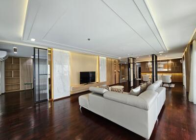 Spacious and modern living room with sleek furnishings and open layout
