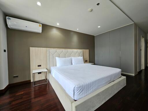 Bedroom with modern furniture and air conditioning