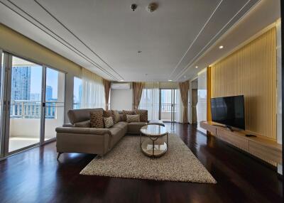 Spacious living room with city view and modern decor