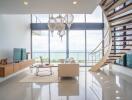 Spacious living room with modern decor and ocean view