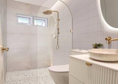 Modern bathroom with terrazzo flooring, floating vanity and frameless shower