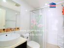 Modern bathroom with glass shower and floral decals