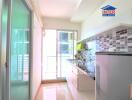 Modern kitchen with grey backsplash and sliding door