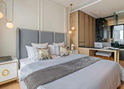 Modern bedroom with gray bedspread and contemporary decor