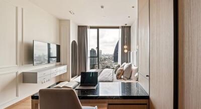 Modern bedroom with city view, featuring desk work area and mounted TV