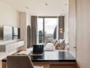 Modern bedroom with city view, featuring desk work area and mounted TV