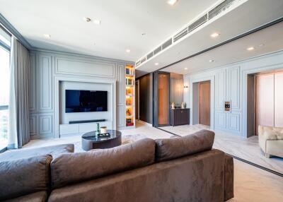 Spacious modern living room with entertainment center and comfortable seating