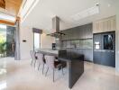 Modern kitchen with island and dining area