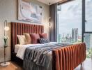 Modern bedroom with a city view, large windows, and stylish decor