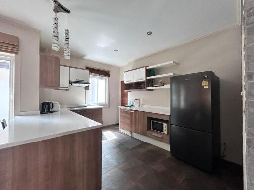 Modern kitchen with appliances and ample counter space