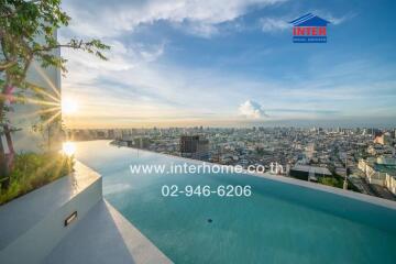 Infinity pool with city skyline view