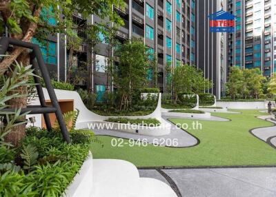 Outdoor garden area with modern building and green space