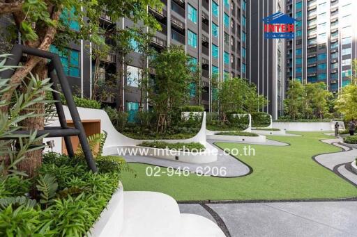 Outdoor garden area with modern building and green space