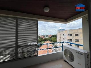 Balcony view with cityscape