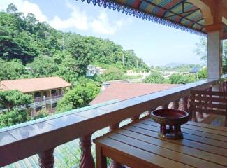 balcony with outdoor seating and scenic view