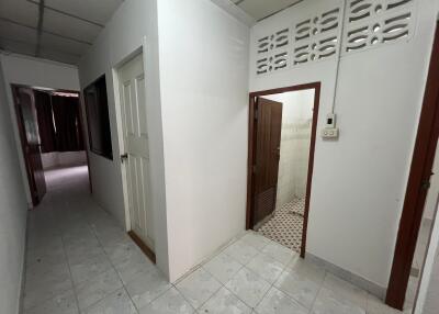 Hallway leading to rooms and bathroom