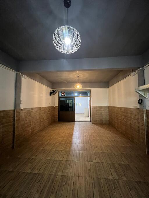 Main living space with a modern light fixture