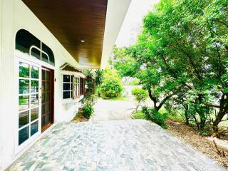 Patio with large windows and garden