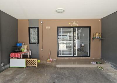 Spacious garage area with storage options and direct access to the house.