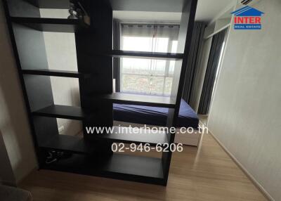 Modern bedroom with partition and large window
