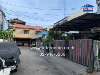 View of residential buildings and gated properties