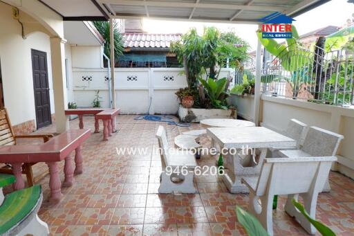 Outdoor patio with seating and plants