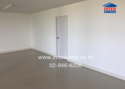 Spacious Empty Room with Plain White Walls