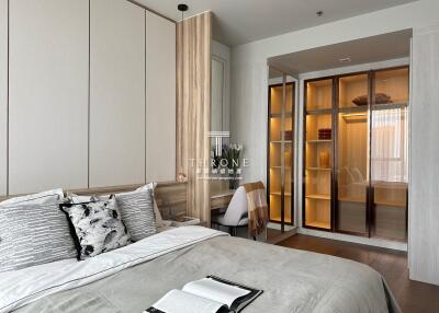 Modern bedroom with built-in wardrobes and study area