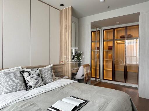 Modern bedroom with built-in wardrobes and study area