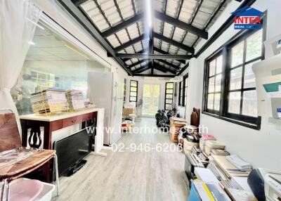 Spacious office with large windows and storage space