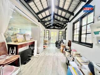 Spacious office with large windows and storage space