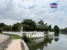 scenic view of a property with surrounding greenery and a waterway